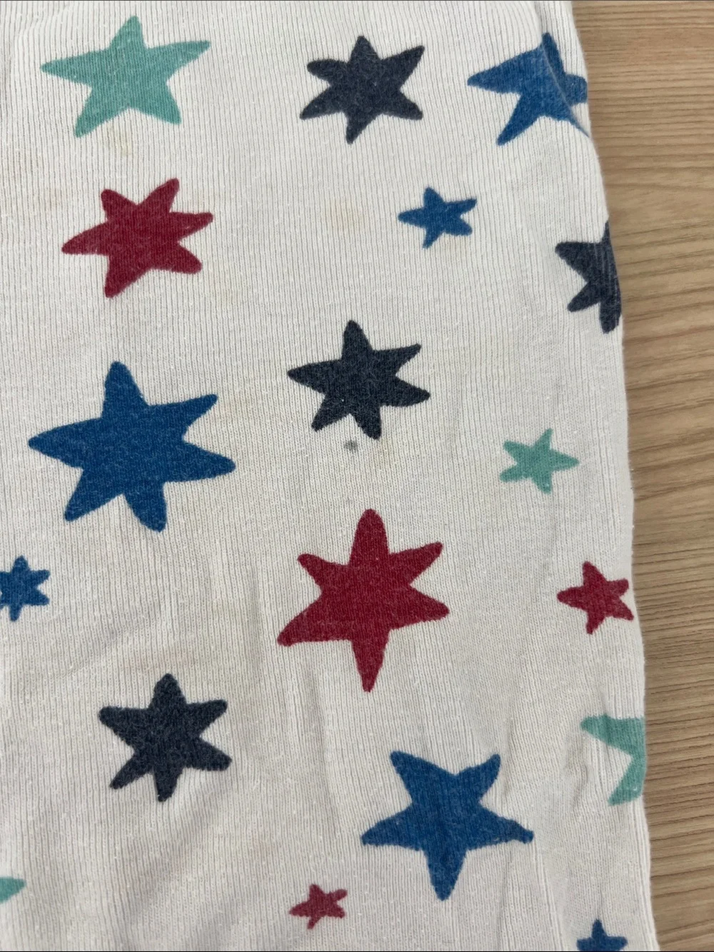 Hanna Andersson White Pajama Set with Blue, Red & Teal Stars